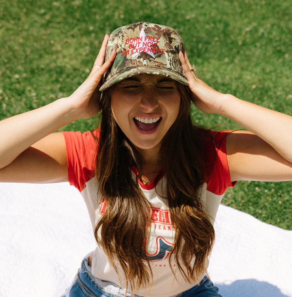 BORN FREE BUT NOW I’M EXPENSIVE Trucker Hat