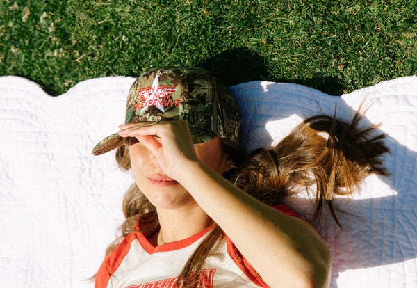 BORN FREE BUT NOW I’M EXPENSIVE Trucker Hat